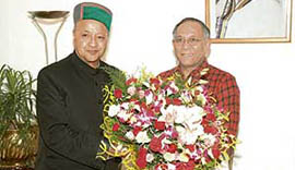 Chief Minister Virbhadra Singh greets Governor V.S. Kokje on the latters 69th birthday in Shimla on Thursday.
