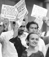 Bhairavi Desai, executive director of the New York Taxi Workers Alliance, pickets with a group near a taxi stand at Pennsylvania Station in New York on Thursday. As the city's two-day taxi job action draws to a finish, Desai once again confirmed her role in the city's labour movement and her willingness to make bold moves on behalf of her membership.