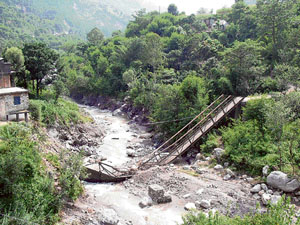Residents of several villages are facing problems as the only footbridge across the Alsed khud at Bhawana, near Sundernagar, which was damaged following heavy rain recently, has not been repaired so far.