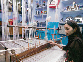 A days labour yields only about two feet of fabric  less if it incorporates a complex motif