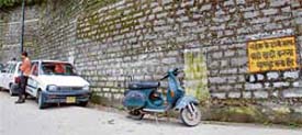 Parking in violation of express directions by the authorities concerned is a routine on the narrow road near St Edwards School in Shimla