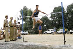 An applicant takes part in the physical test at the police lines in Shimla on Sunday.