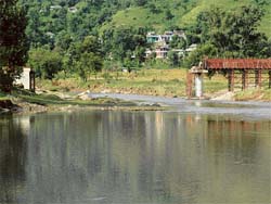 The bridge under construction across the Suketi khad at Gutkat, Mandi. This bridge was washed away in the recent floods. 