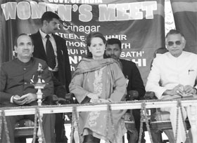 UPA chairperson Sonia Gandhi flanked by home minister Shivraj Patil and Chief Minister Ghulam Nabi Azad during a womens meeting at the Sher-e-Kashmir Convention Complex (SKICC) in Srinagar on Monday.