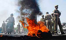 Rameshwaram Ram Setu Raksha Manch activists burn tyres to protest against the move to demolish Ram Setu in the sea between India and Sri Lanka in Jammu on Wednesday.