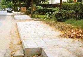 The footpath which has been laid on the wrong side of V-5 road in Sector 16, Chandigarh