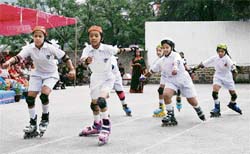 Students of Auckland School participate in the roller-skating race during the sports meet in Shimla