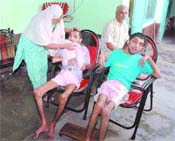 Kapoor village couple is battling against heavy odds. The degenerative disease has left their kids 