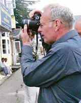 UNESCO heritage team leader Robert Lee is busy clicking photographs on The Mall, Shimla.