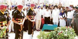 Capt Kanwaljit Singh, minister for cooperation, pays tributes to Saragarhi martyrs at Jhorran village on Friday.