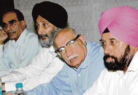 Adesh Pratap Singh Kairon, minister of food and civil supplies, consumer affairs and information technology, Punjab (second from left), during Engineers’ Day celebrations at Institute of Engineers, Sector 19 in Chandigarh on Saturday.