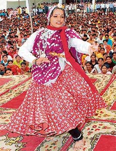 A student presents an item at a talent hunt show at Government PG College in Karnal