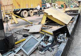Remains of a tollbooth after being smashed by a tanker on the national highway near Karnal