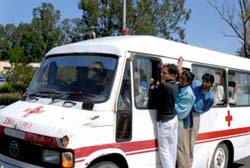 Not for emergency duty: An overloaded ambulance carries locals in Jammu. 