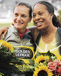 Russia's Yelena Isinbayeva (L) and Sanya Richards of the USA celebrate after winning the ISTAF Golden League athletics in Berlin on Sunday. Isinbayeva and American 400m sprinter Sandra Richards will share the $1,000,000 (722,000 euros) jackpot after they both recorded their sixth consecutive Golden League win of the season
