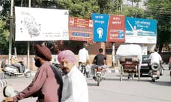 Hoardings and posters have defaced Ludhiana