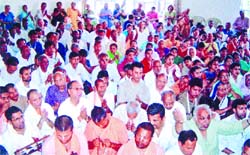 Devotees of the Sree Chaitanya Gaudia Math perform kirtan to celebrate Radha Ashtami on the Math premises at Paharganj in the Capital on Wednesday.