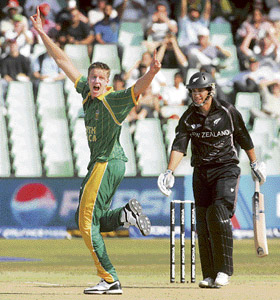 South Africa's Morne Morket celebrates the wicket of New Zealand's Ross Taylor during their ICC World Tweny20 cricket match in Durban on Wednesday.