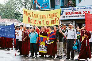 Tibetan youths hold a rally against the China Government for arresting Tibetans in Tibet and disallowing them to select any reincarnation without its consent, in Dharamsala on Thursday.