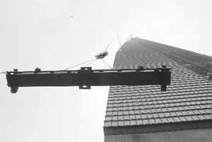 The last girder goes up on Chinas tallest building, the World Financial Centre in Shangai.