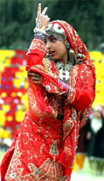 A girl student wearing traditional attire performs during a cultural programme at the annual day celebrations of a missionary school in Srinagar on Thursday. 