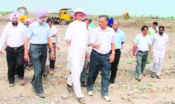 Principal secretary P. Ram takes a stock of the situation at the Jamalpur garbage dump in Ludhian