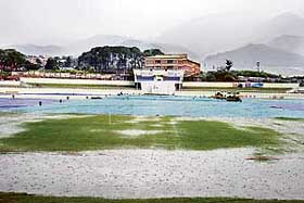The waterlogged ground of the HPCA Stadium on the third day of the match between India A and South Africa A at Dharamsala on Friday.