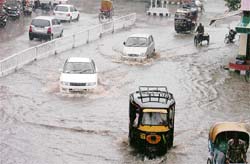 Deluge on Damoria Bridge after rain lashed Ludhiana on Saturday.