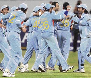 The Indian team celebrates after beating Australia in the second semifinal of the Twenty20 World Cup in Durban on Saturday.