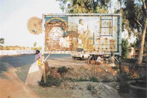 Bhagat Singhs picture on the road leading to his village in Pakistan