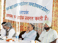 BJP MP and president of the World Jat Aryan Foundation Navjot Singh Sidhu addresses members of the Jat community at Dharamsala on Sunday.