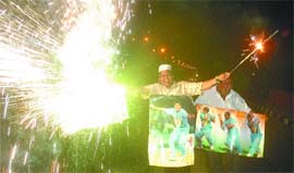 Activists of the Akhil Bhartiya Muslim Yuva Ekta Committee celebrate the victory of the Indian cricket team in 20;20 World Cup in the Capital