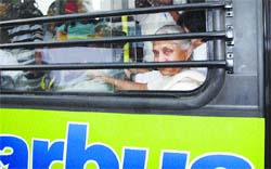 Delhi Chief Minister Sheila Dikshit inspects low-floor bus at Hauz Khas Bus Terminal in the Capital