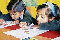 Students of Regal Public School participate in a painting competition on the school premises in Shimla