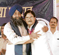 BSP national general secretary and in charge of party affairs in Himachal Mansingh Manhera announces the appointment of former MLA Krishan Kumar Kaushal as state general secretary of the party at a rally at Jhanda, near Bilaspur, on Wednesday.