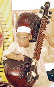 PLAY ON: Rudra veena maestro Ustad Asad Ali Khan performs at Taksal Gurdwara during a show organised by SPICMACAY in Ludhiana on Wednesday. He held the audience spellbound for more than an hour.