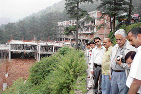 V.P. Jayakrishnan, chairman of the Central Empowered Committee (CEC), constituted by the Supreme Court, inspects the controversial bus stand site at McLoedganj on Thursday.