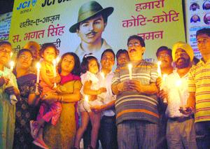 JCI, Jalandhar, celebrates birth centenary of Bhagat Singh by lighting candles and diyas on Thursday. 