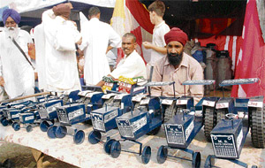 Toy tractors for sale at Chhapar mela in Ludhiana on Thursday.