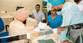 A team of the Punjab Vigilance Bureau examines documents of former DGP, Punjab, S.S. Virk in Chandigarh on Thursday.