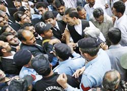 Pakistan police scuffle with lawyers outside the election commission office in Islamabad