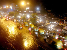 Heavy rain makes Bahadur Shah Zafar Marg a cesspool, bringing traffic to a virtual halt, and also reducing the temperature considerably, in the Capital on Friday evening.