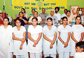Girl students sing at a function held on the occasion of the birth centenary of Shaheed Bhagat Singh at a government school in Karnal on Friday.