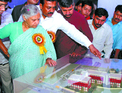 Chief Minister Sheila Dikshit inspects the model of school building at Gazipur in the Capital on Saturday. Local MP Sandeep Dikshit and area MLA Naseeb Singh are also seen in the picture.