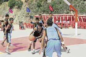 Players of DAV School, Solan, in action during the DAV Inter-School Basketball Championship (Himachal Region) at Palampur, on Saturday.