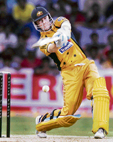 Australias Michael Clarke plays a shot during the first one-day international match against India at the Chinnaswamy Stadium in Bangalore on Saturday. 