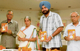 MP Navjot Singh Sidhu and Punjab health minister Laxmi Kanta Chawla during a book release function in Chandigarh on Sunday