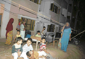 A family camps out in the open at the Police Lines in Panchkula on Sunday.