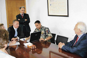 Officials from Fransa Bank are briefed by an Indian Army officer on the artificial limb project in Lebanon.