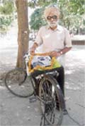 Narinder Singh garlands the photograph of Partap Singh Kairon, third Chief Minister of Punjab, in Chandigarh